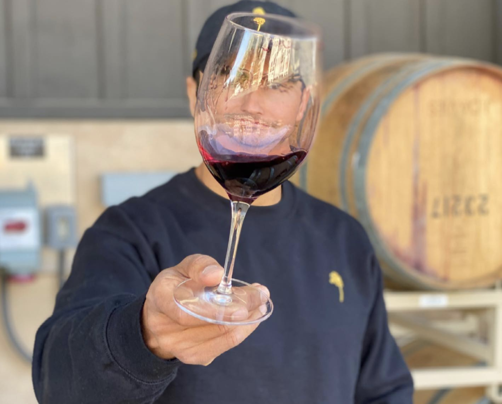 Winemaker Malek Amrani tasting Vice Wine barrel samples