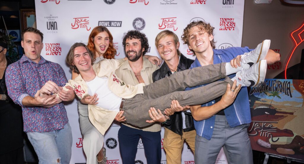 Red carpet shenanigans Jake Stirn & Friends BandLeft to right: Garrett Easterly (bass), Riley Davis (background vocals), Zach Sutton (drums), Phil Coffey (keys), Dylan Andrews (guitar) Stirn in the middle Photo: Eugene Powers 