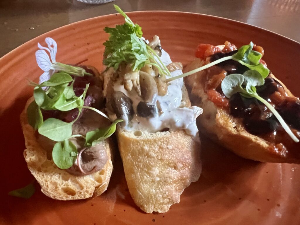 Mon Ami; Tapas Trio: Truffle mushroom, Chicken Mousse with a Pickled Onion, Spicy Tomatoes and Pepper