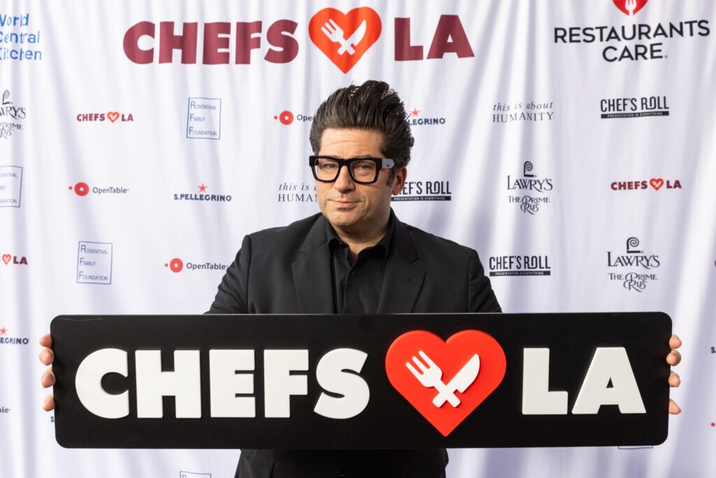 Billy Harris led the Live Auction for Chefs Love LA