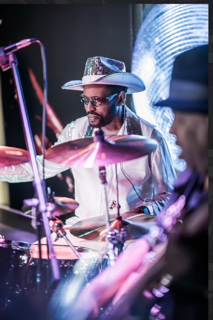 Drummer Michael Seacer was as brilliant and shone as brightly as as his self made outfit! Photo: Eric Allen