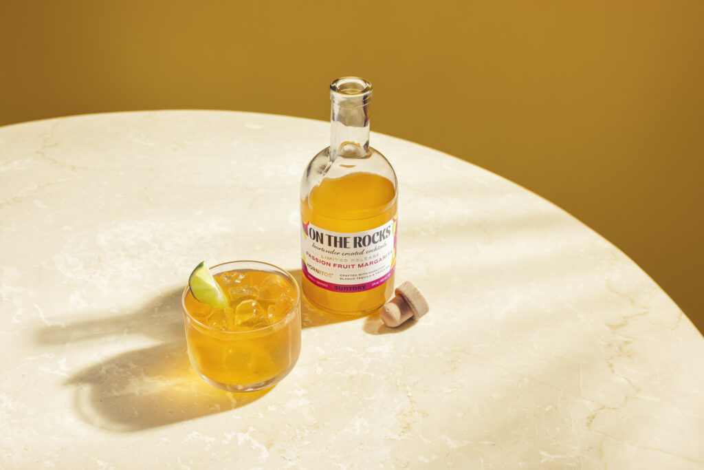 On The Rocks launches a limited Passion Fruit Margarita Ready to Drink and sparkling watermelon RTD — both made with Hornitos Blanco. Find them now.