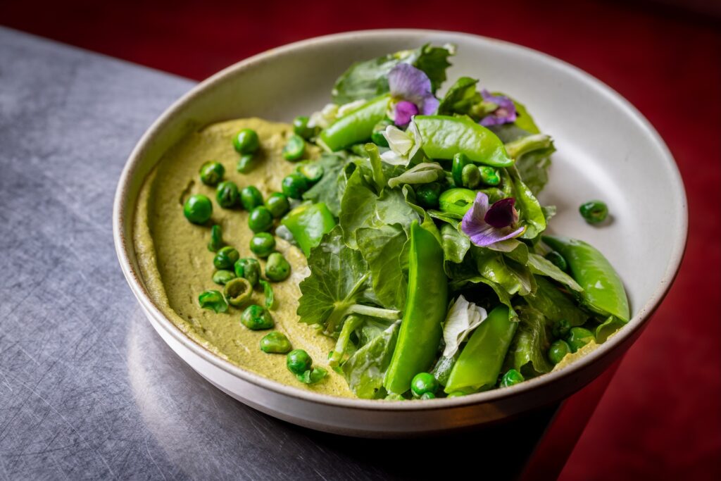 Wife and the Somm first course opens with a Pea Tendril Salad
