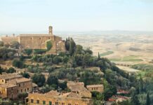 Universal's You, Me & Tuscany opened to $8M with Regé-Jean Page and Halle Bailey. Can mid-budget rom-coms work in 2026? Box office analysis.