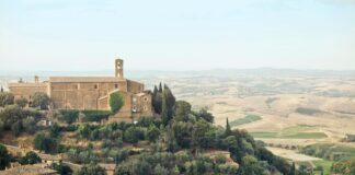 Universal's You, Me & Tuscany opened to $8M with Regé-Jean Page and Halle Bailey. Can mid-budget rom-coms work in 2026? Box office analysis.